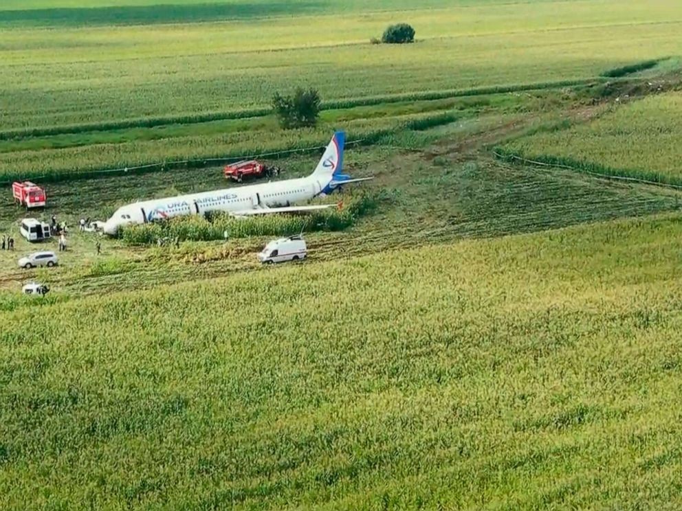 Plane in Russia on the grass
